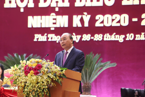 Đồng chí Nguyễn Xuân Phúc - Ủy viên Bộ Chính trị, Thủ tướng Chính phủ nước Cộng hòa XHCN Việt Nam phát biểu ý kiến chỉ đạo tại Đại hội.